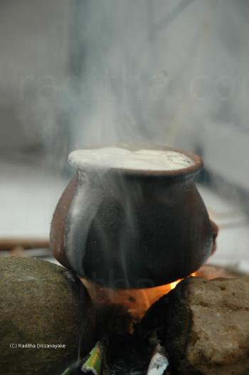 Boiling milk on a fire